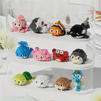 Version Boîte Cadeau de 12 Petites Boîtes Série Petites Créatures de l'Océan Micro Blocs de Construction Granulaires