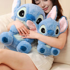 Disney Poupée Assise de la Série Basique Stitch, Cadeau d'Anniversaire Mignon et Doux en Peluche Disponible dans Diverses Tailles