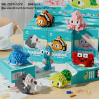 Version Boîte Cadeau de 12 Petites Boîtes Série Petites Créatures de l'Océan Micro Blocs de Construction Granulaires