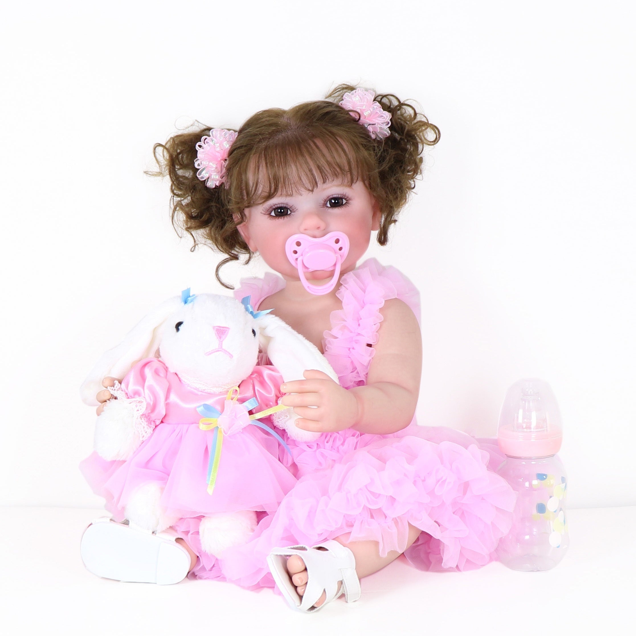 Poupée Reborn de 22 pouces - Mouvement joyeux avec un visage peint 3D, un corps en vinyle souple et des cheveux racinés, accompagné d'un petit lapin en peluche, parfait pour des cadeaux de Noël, d'Halloween ou de Thanksgiving.